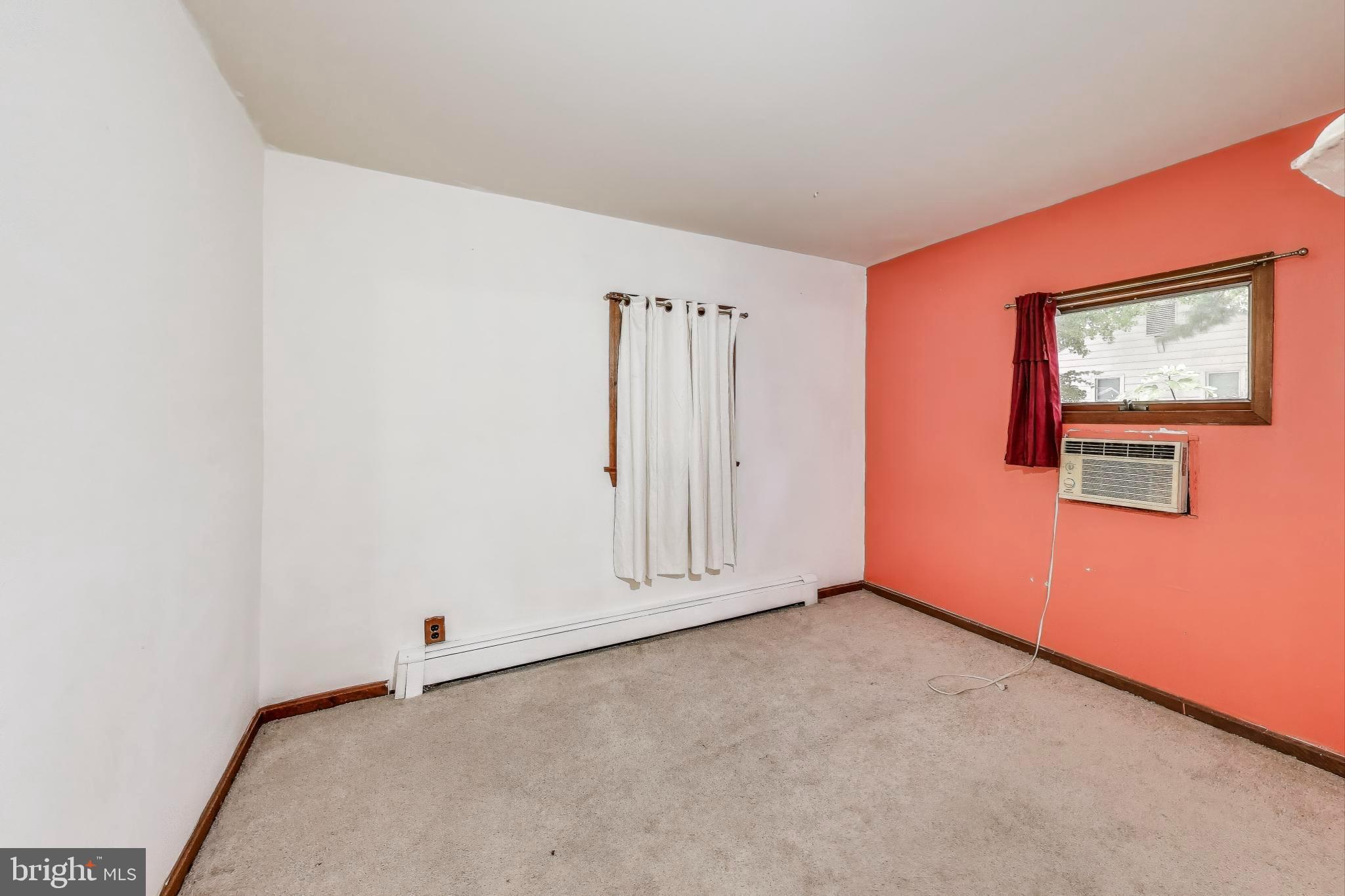 9211 Fowler Lane Lanham, MD 20706 - Photo 21 of 50 an empty room with a door