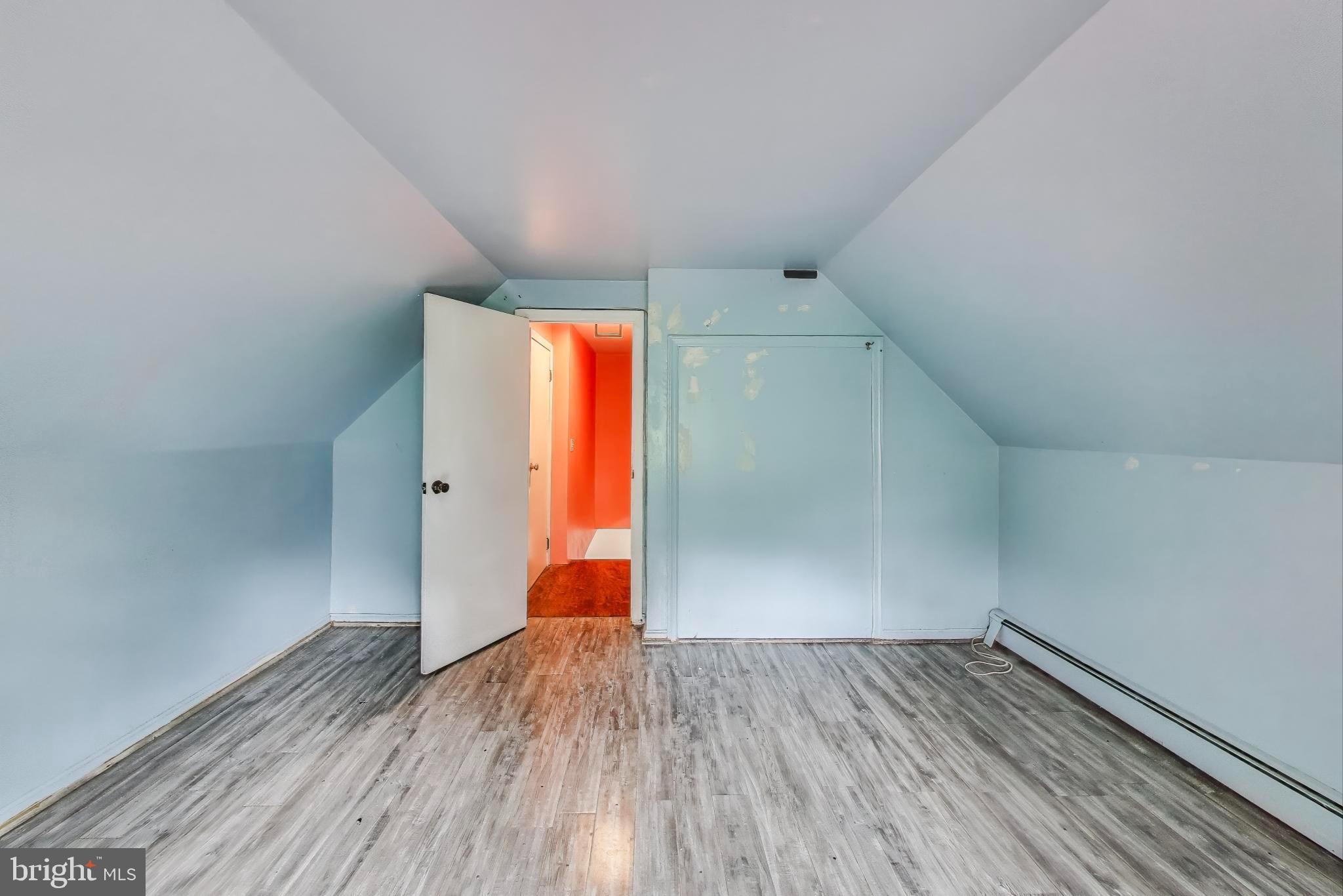 9211 Fowler Lane Lanham, MD 20706 - Photo 25 of 50 a view of empty room with wooden floor