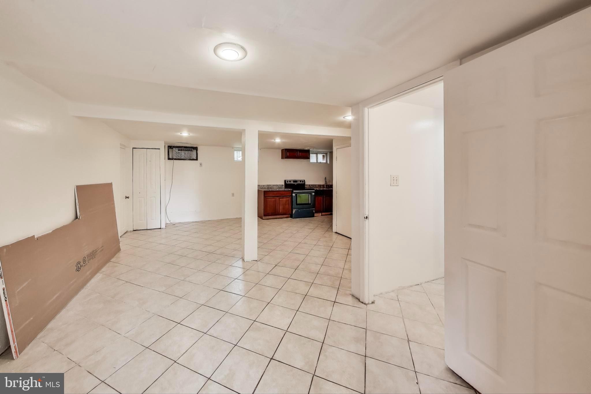 9211 Fowler Lane Lanham, MD 20706 - Photo 28 of 50 a view of empty room with wooden floor