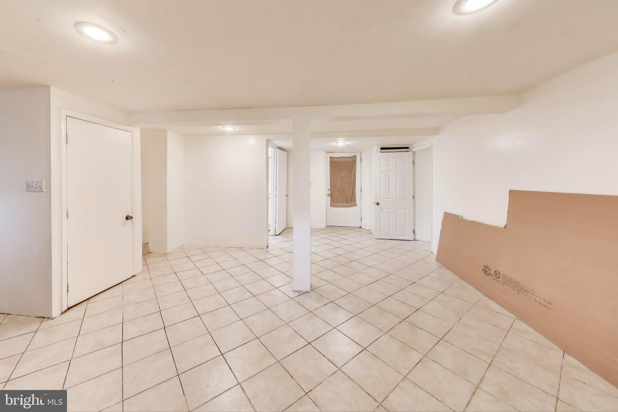 9211 Fowler Lane Lanham, MD 20706 - Photo 29 of 50 a view of a livingroom with a dishwasher