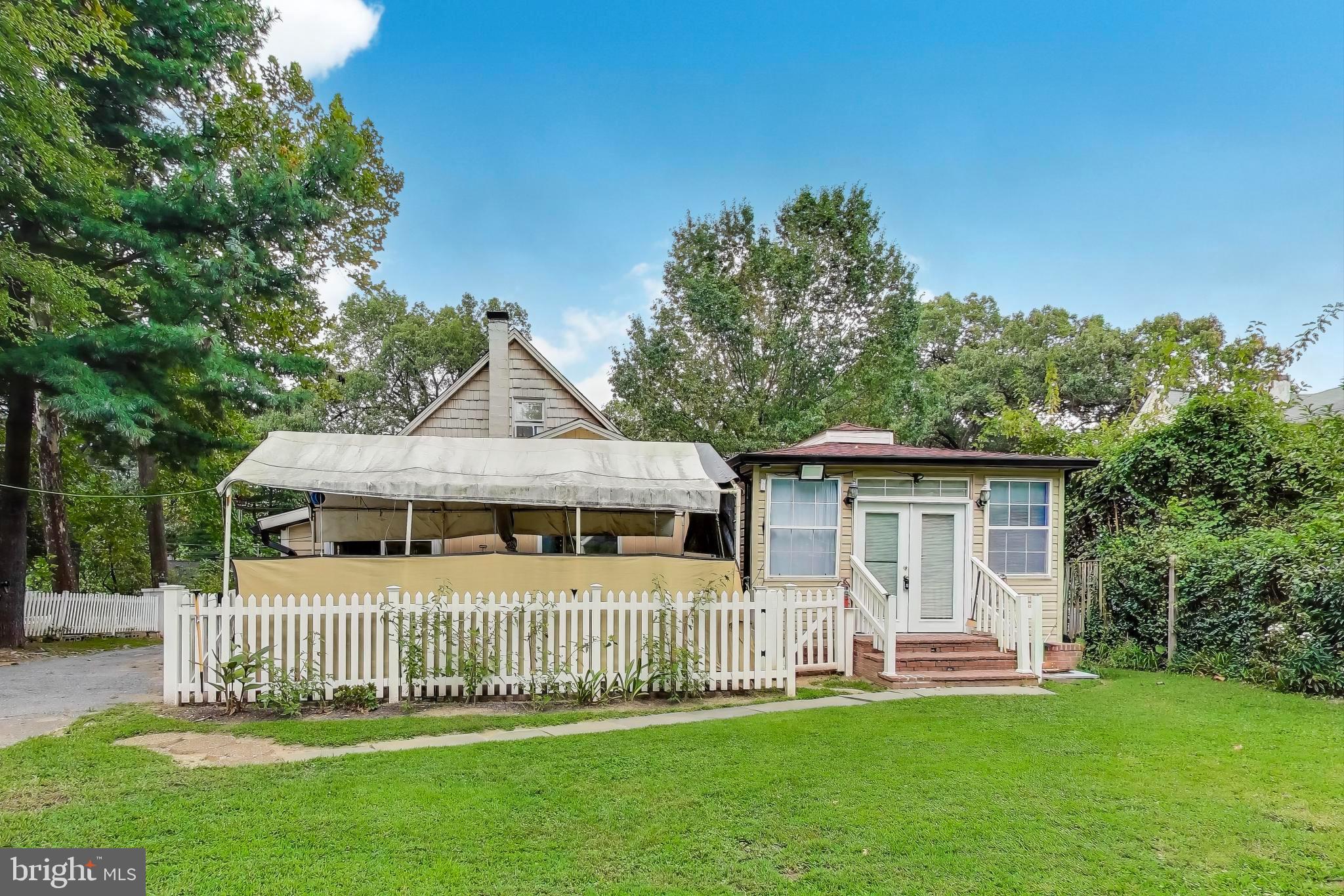 9211 Fowler Lane Lanham, MD 20706 - Photo 38 of 50 a front view of a house with a yard