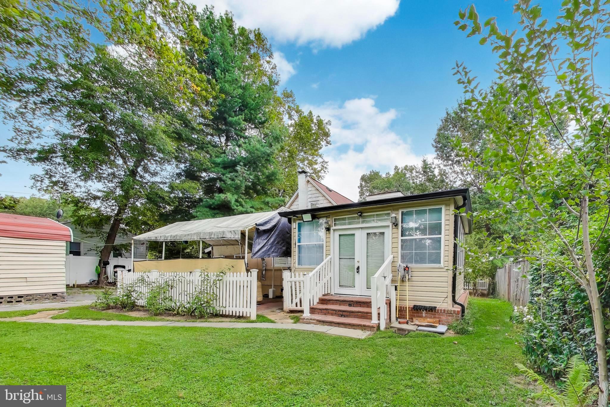9211 Fowler Lane Lanham, MD 20706 - Photo 39 of 50 front view of a house with a yard