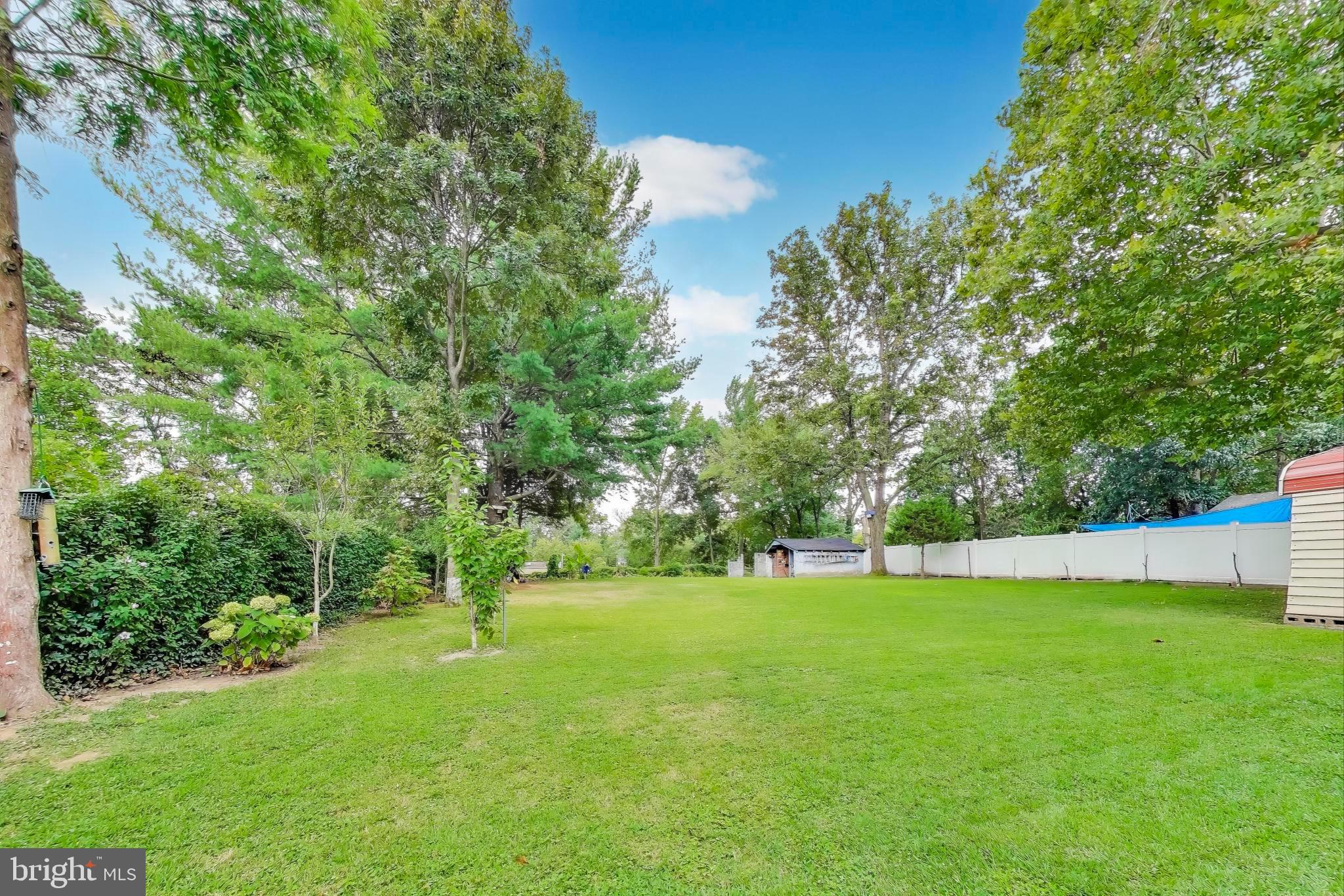9211 Fowler Lane Lanham, MD 20706 - Photo 42 of 50 a view of green field with trees in the background