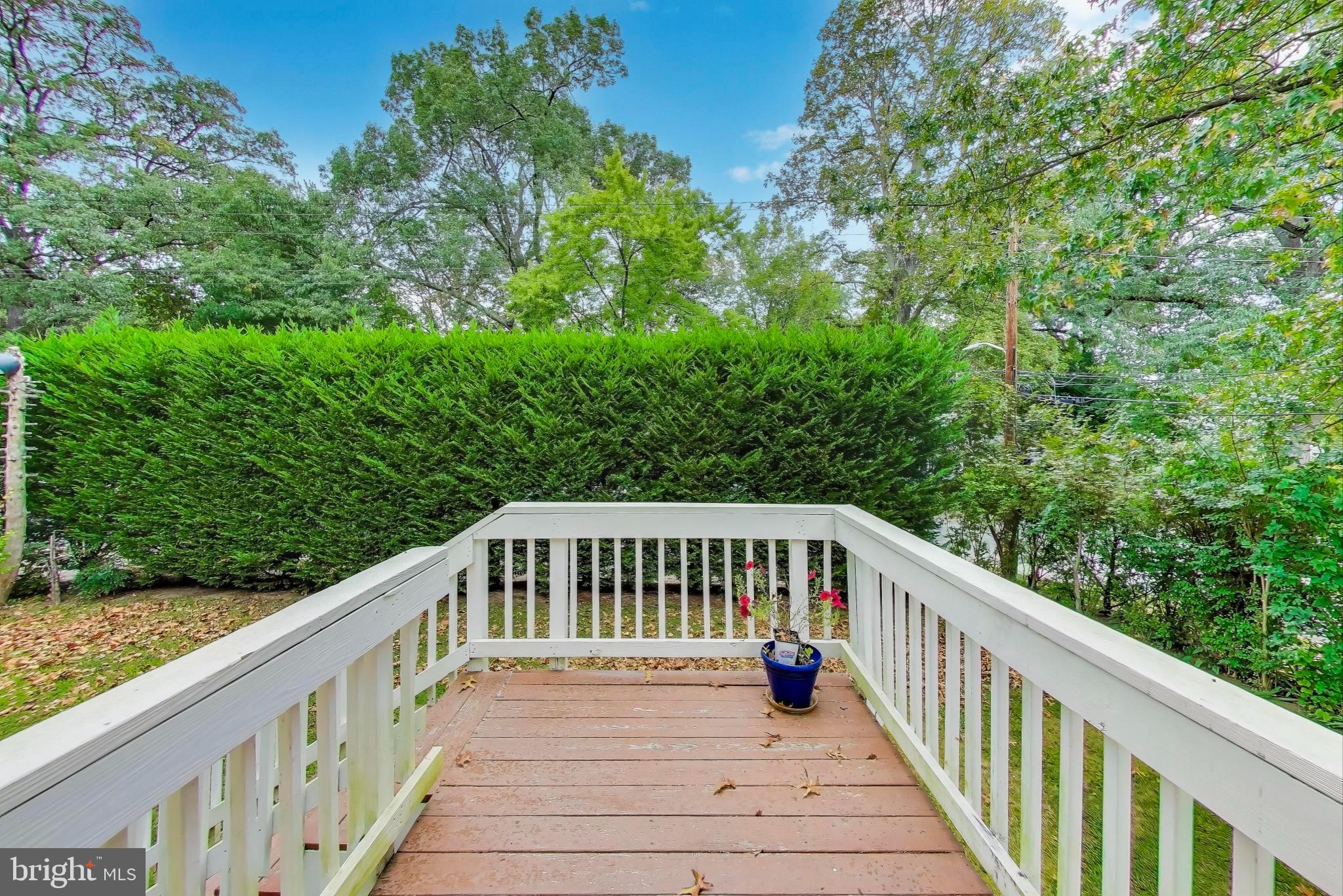9211 Fowler Lane Lanham, MD 20706 - Photo 5 of 50 a view of balcony with deck and trees