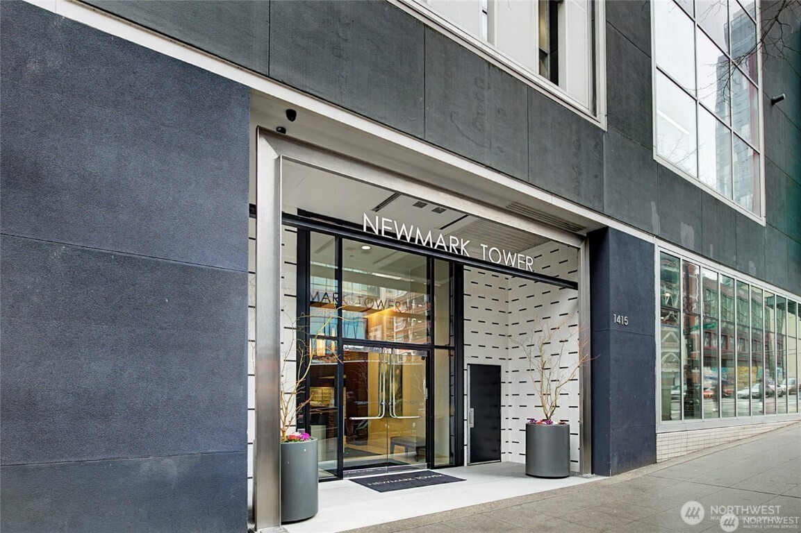 1415 2nd Avenue, Unit 1209 Seattle, WA 98101 - Photo 1 of 21 a front view of a building with an entrance
