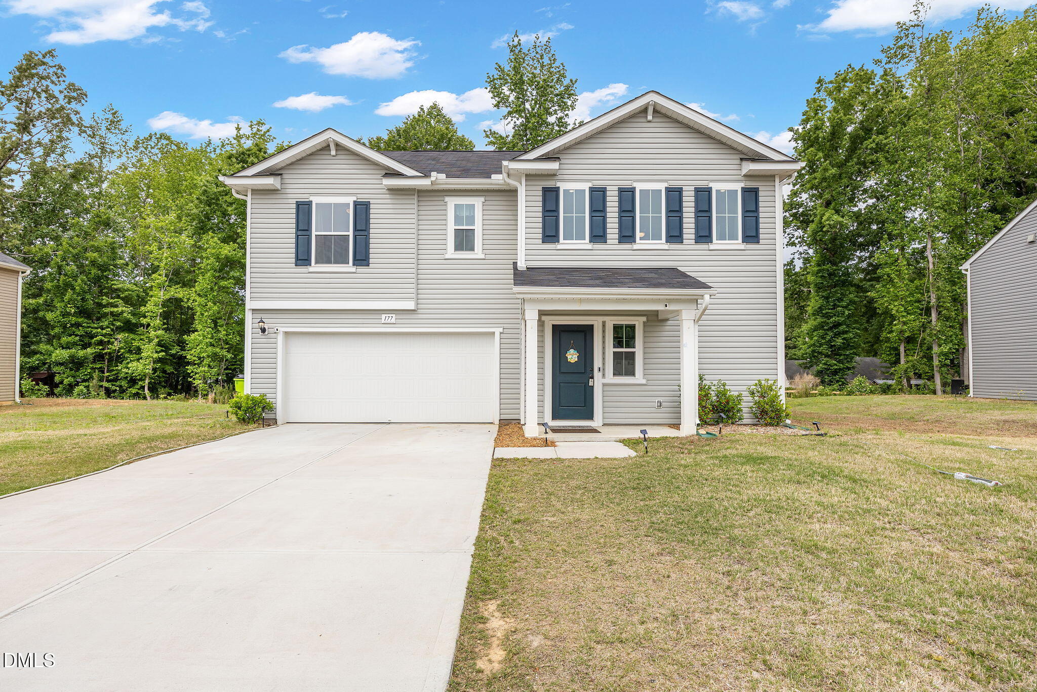 177 Yellowwood Avenue Spring Hope, NC 27882 - Photo 29 of 31 a front view of a house with a yard and garage