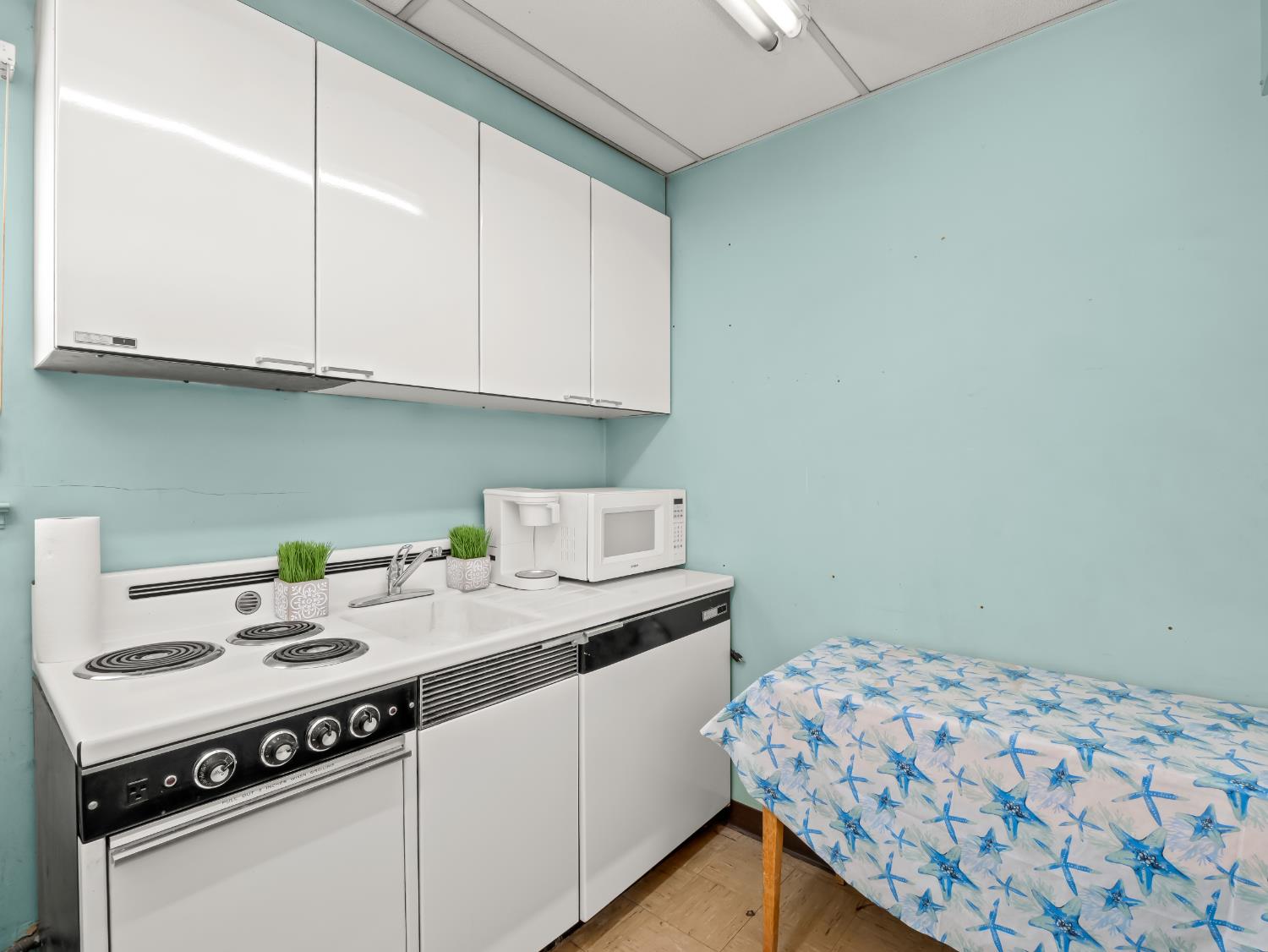 701 Mayor Avenue Fresno, CA 93706 - Photo 14 of 28 a kitchen with a sink cabinets and appliances