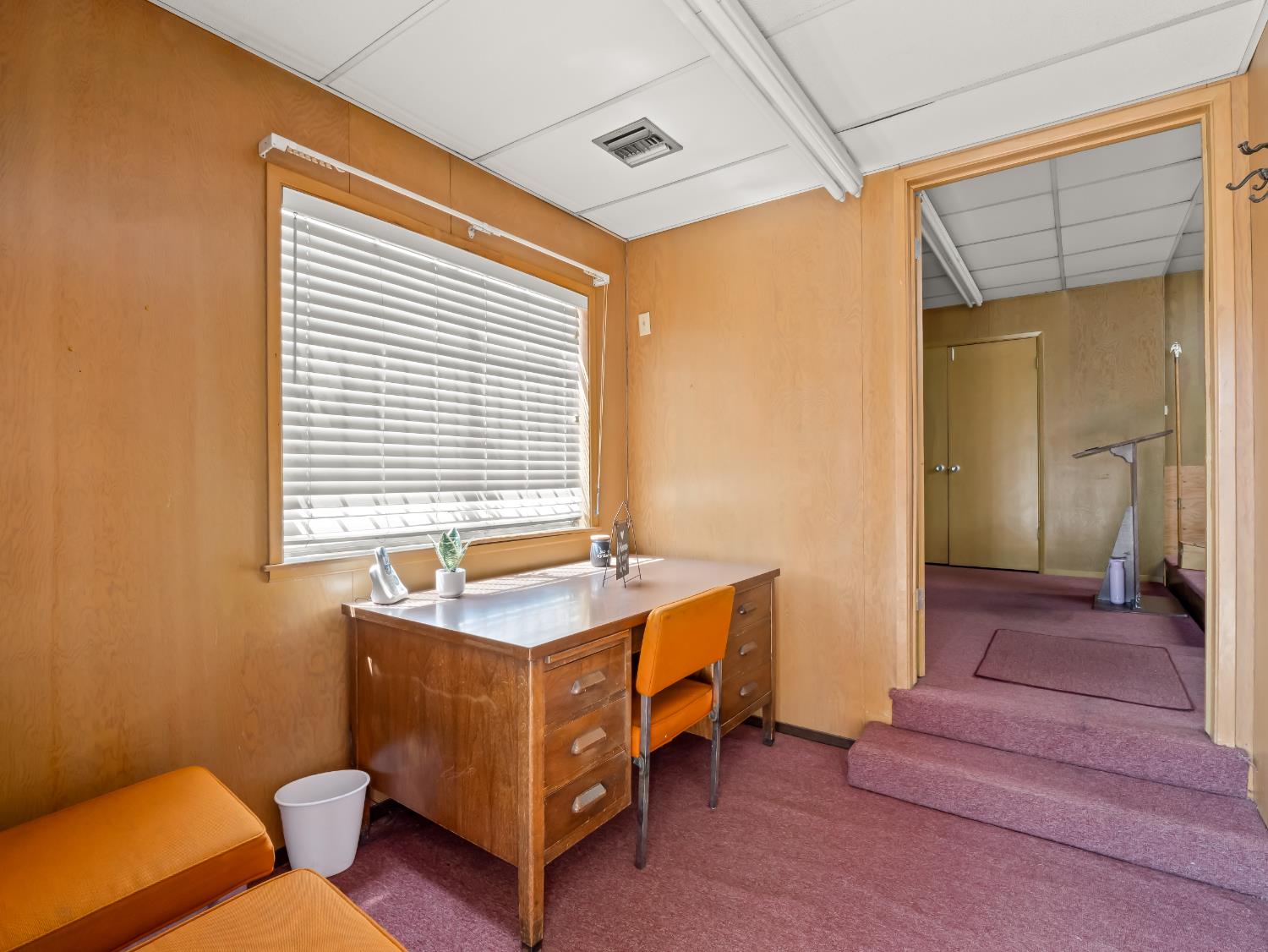 701 Mayor Avenue Fresno, CA 93706 - Photo 17 of 28 a bedroom with bed and a window