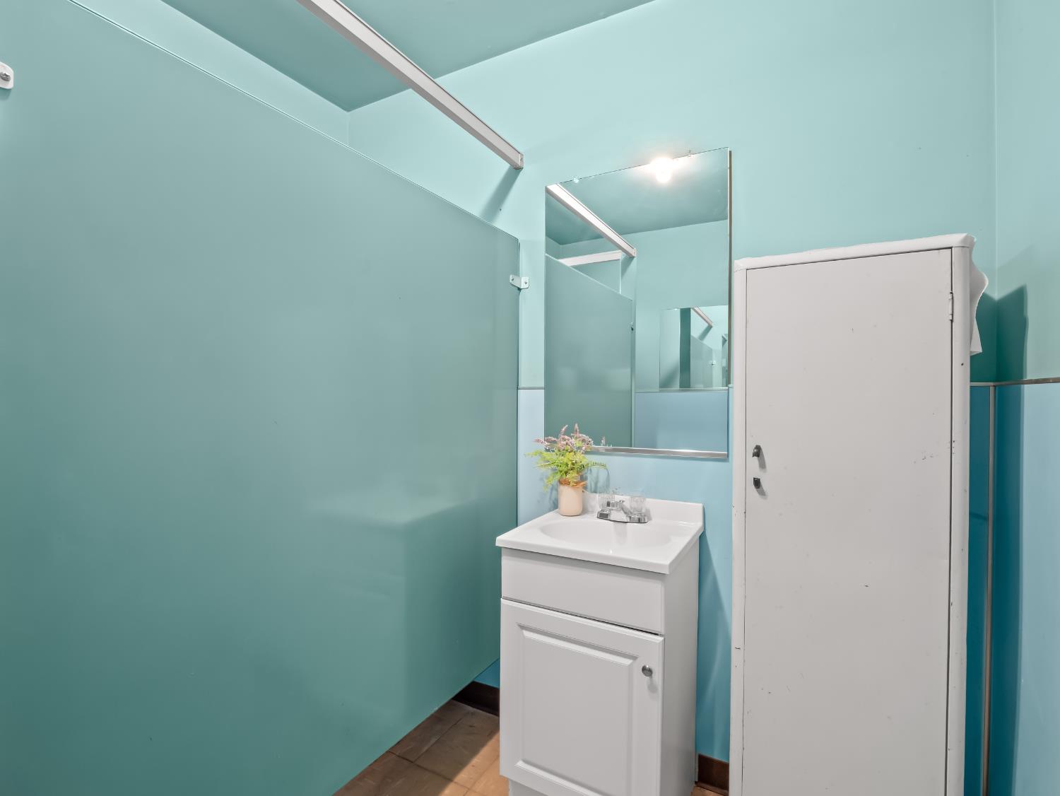 701 Mayor Avenue Fresno, CA 93706 - Photo 19 of 28 a bathroom with a sink a toilet and shower