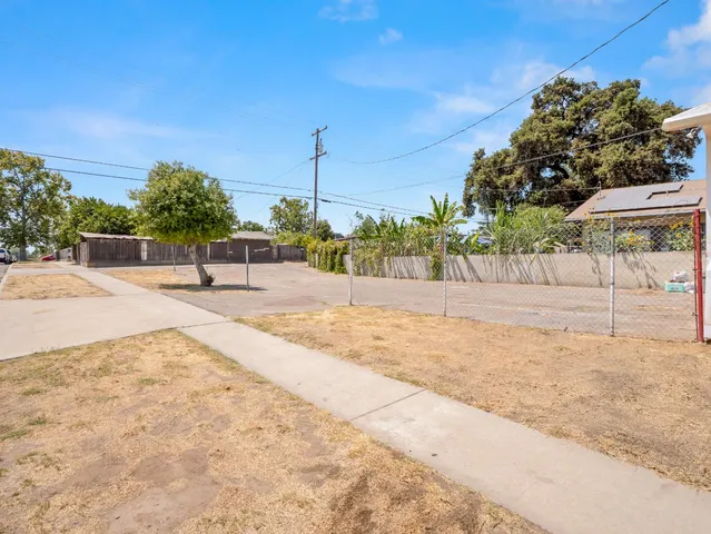 a view of a backyard of a house
