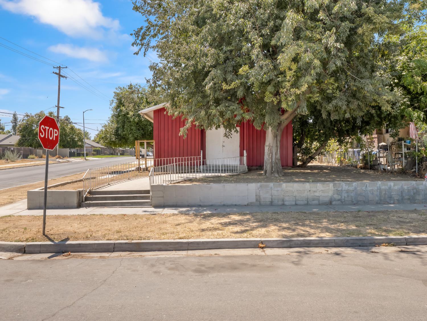 701 Mayor Avenue Fresno, CA 93706 - Photo 3 of 28 a front view of a house with street
