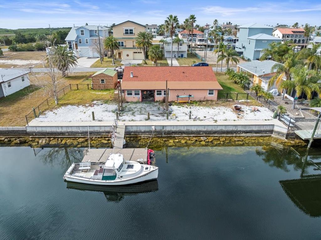 4102 Des Prez Court Hernando Beach, FL 34607 - Photo 11 of 52 a view of a city with lawn chairs
