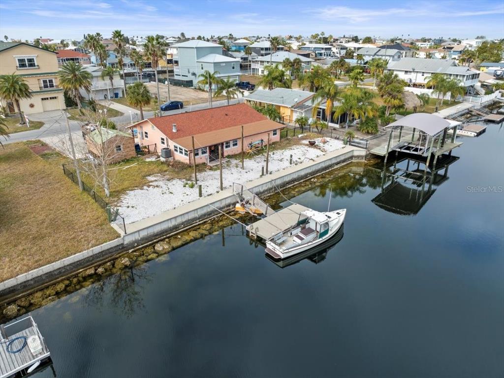 4102 Des Prez Court Hernando Beach, FL 34607 - Photo 15 of 52 an aerial view of residential houses with outdoor space