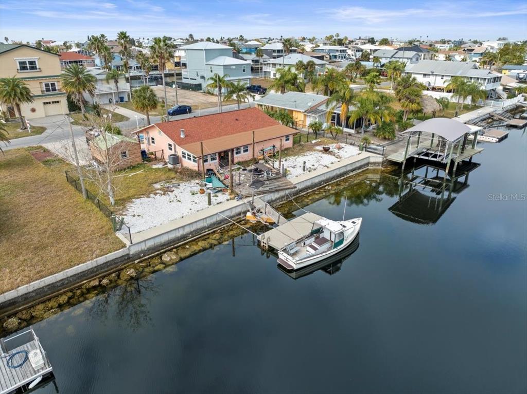 4102 Des Prez Court Hernando Beach, FL 34607 - Photo 16 of 52 an aerial view of residential houses with outdoor space
