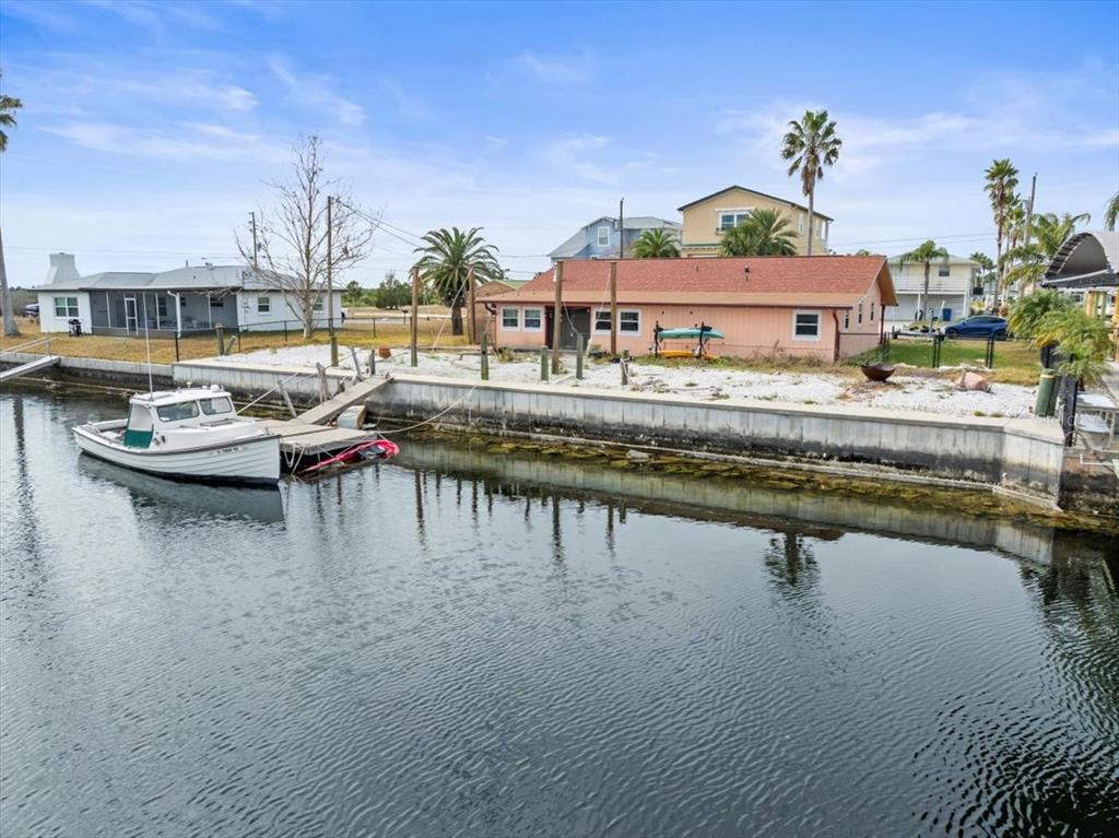 4102 Des Prez Court Hernando Beach, FL 34607 - Photo 19 of 52 a view of swimming pool with outdoor seating