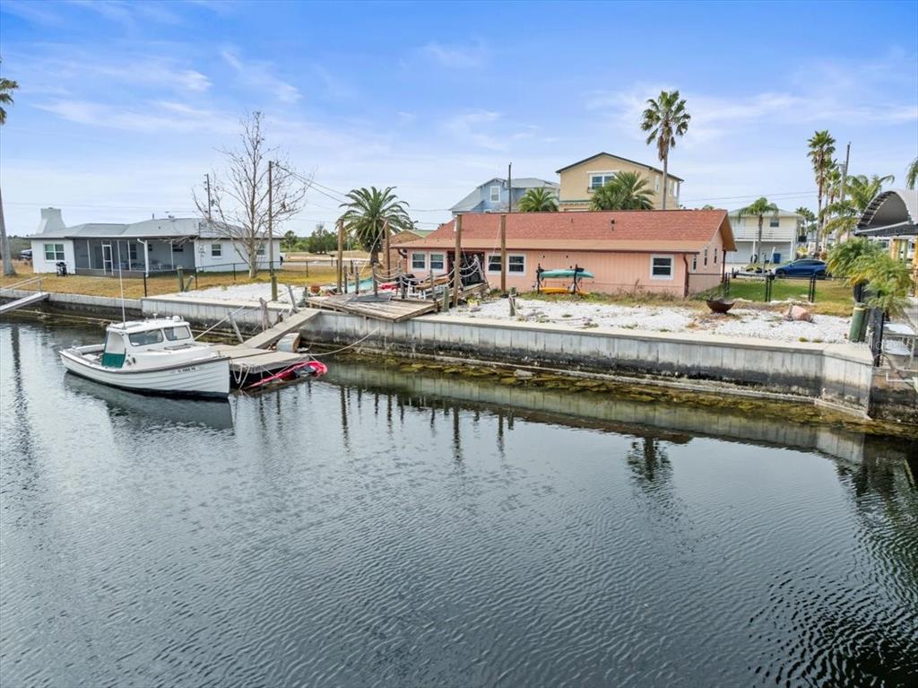 4102 Des Prez Court Hernando Beach, FL 34607 - Photo 20 of 52 a view of swimming pool with outdoor seating yard and barbeque oven