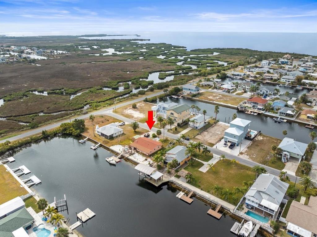 4102 Des Prez Court Hernando Beach, FL 34607 - Photo 25 of 52 an aerial view of residential houses with outdoor space