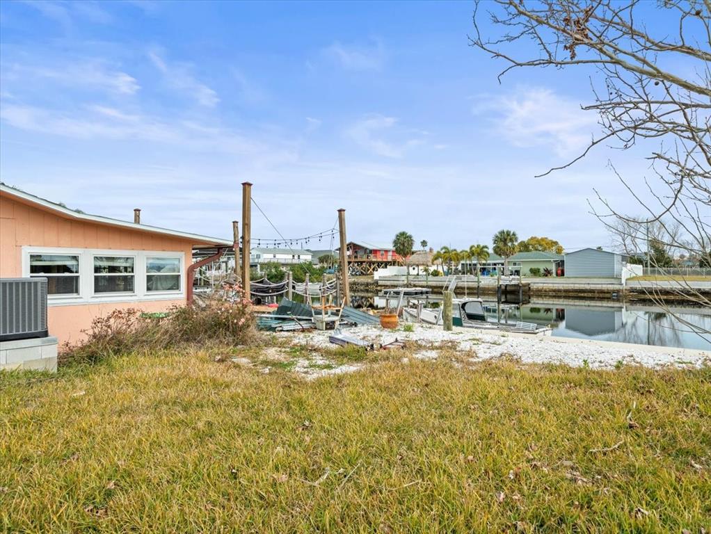 4102 Des Prez Court Hernando Beach, FL 34607 - Photo 35 of 52 a view of a swimming pool with an ocean view