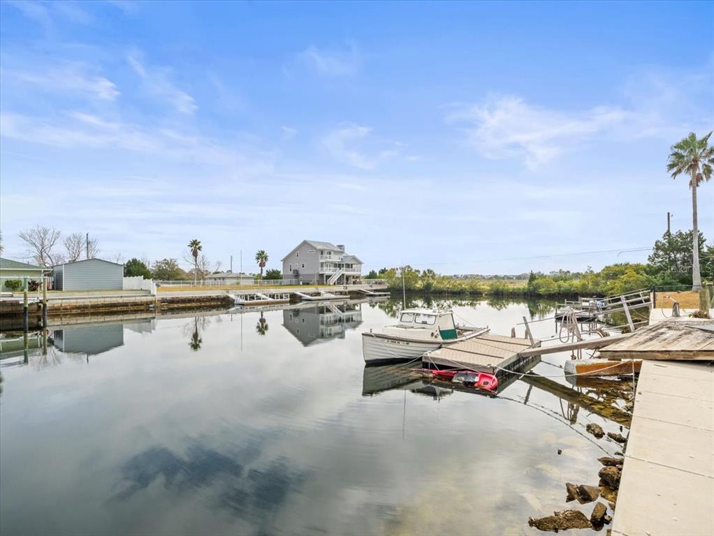 4102 Des Prez Court Hernando Beach, FL 34607 - Photo 39 of 52 a view of boats and trees in a terrace