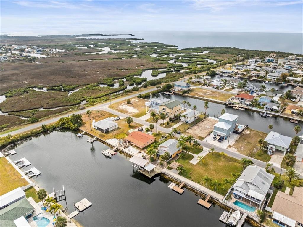 4102 Des Prez Court Hernando Beach, FL 34607 - Photo 44 of 52 an aerial view of residential houses with outdoor space