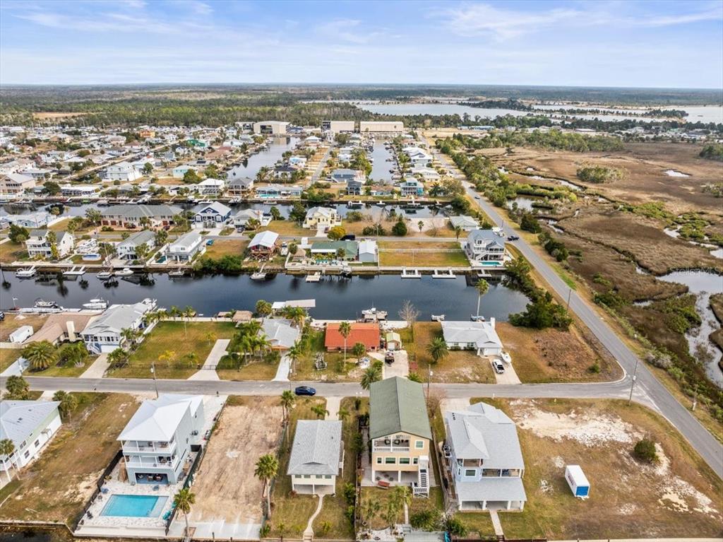 4102 Des Prez Court Hernando Beach, FL 34607 - Photo 47 of 52 an aerial view of residential building and ocean view