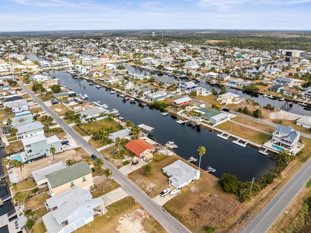 4102 Des Prez Court Hernando Beach, FL 34607 - Photo 48 of 52 an aerial view of residential houses with outdoor space