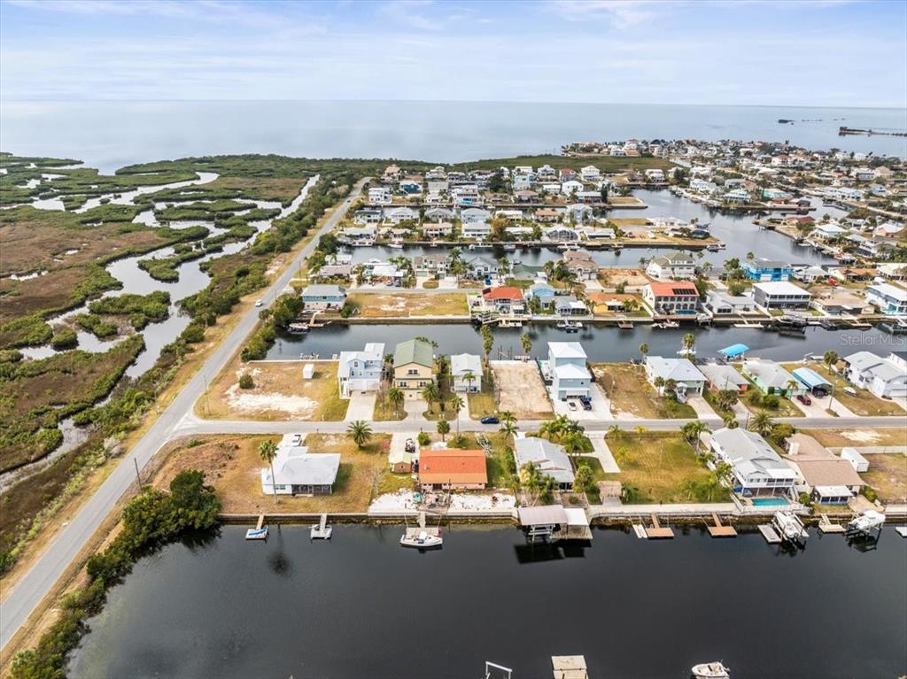 4102 Des Prez Court Hernando Beach, FL 34607 - Photo 51 of 52 an aerial view of residential building with parking space