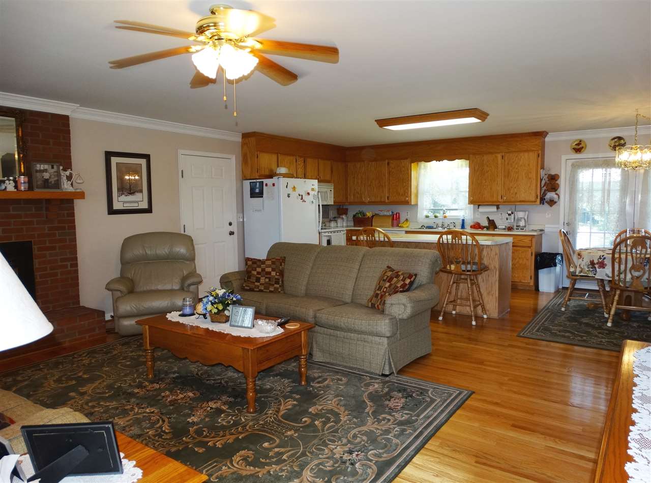 324 Good Hope Church Road Aroda, VA 22709 - Photo 11 of 32 a living room with fireplace furniture and a large window