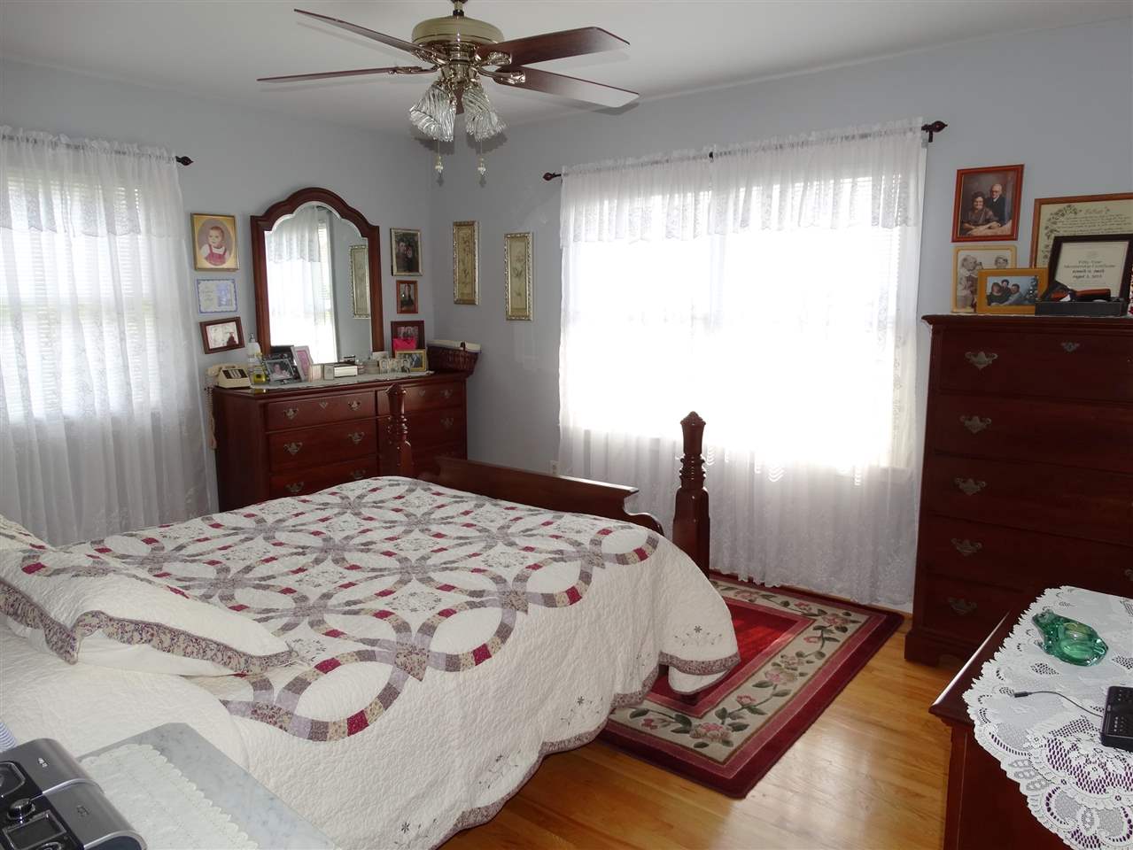 324 Good Hope Church Road Aroda, VA 22709 - Photo 26 of 32 a bedroom with a bed and a dresser with mirror