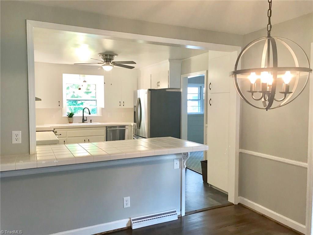 2629 Weymoth Road Winston-Salem, NC 27103 - Photo 8 of 22 Bar between Kitchen & Dining Room