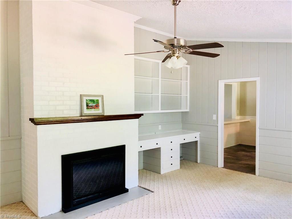 2629 Weymoth Road Winston-Salem, NC 27103 - Photo 9 of 22 Den w/ built-in shelves & Vaulted ceiling
