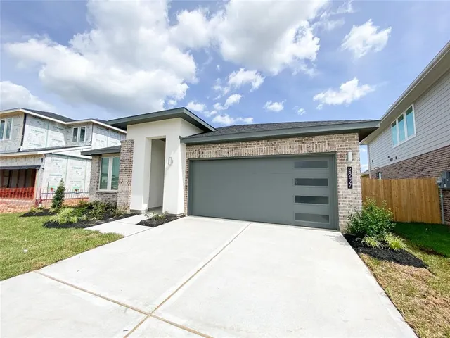 a house view with a garden space
