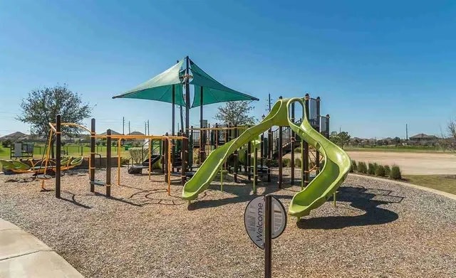 a view of a house with a swimming pool