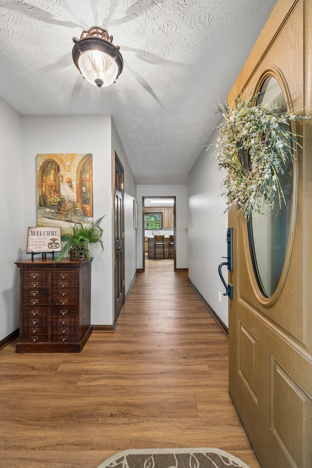 20 Riverbend Lane Carthage, TN 37030 - Photo 10 of 71 a view of a livingroom with wooden floor and a chandelier