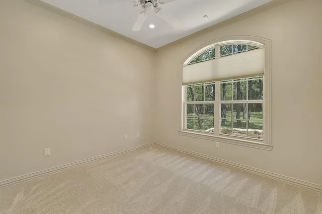 a spacious bathroom with a tub sink shower and mirror