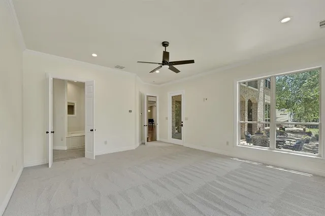 a view of a room that has a large window