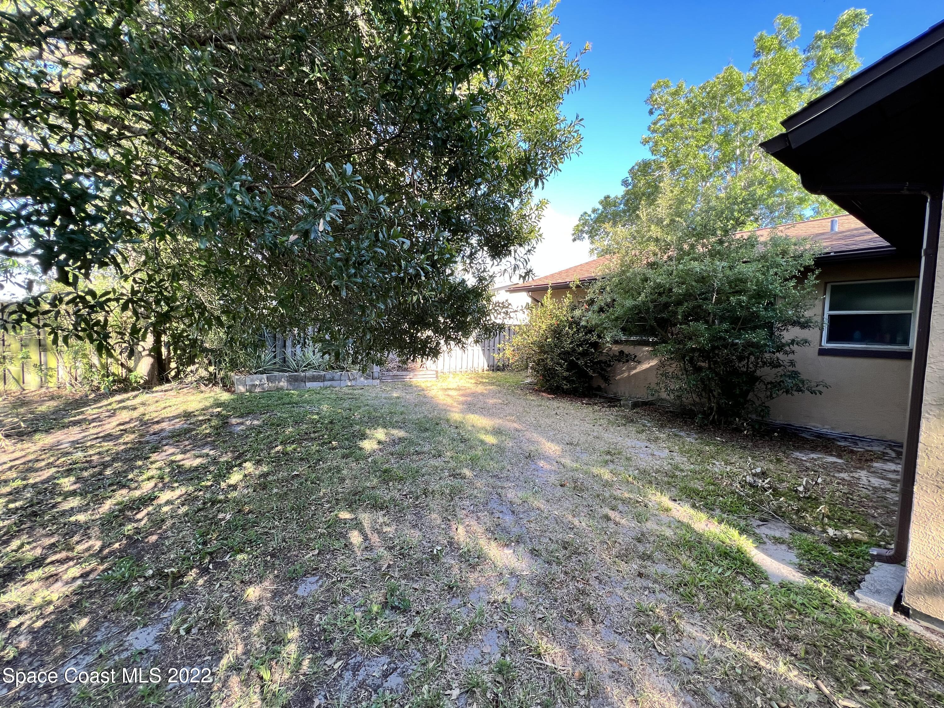 974 Macco Road Cocoa, FL 32927 - Photo 11 of 12 a view of backyard with green space