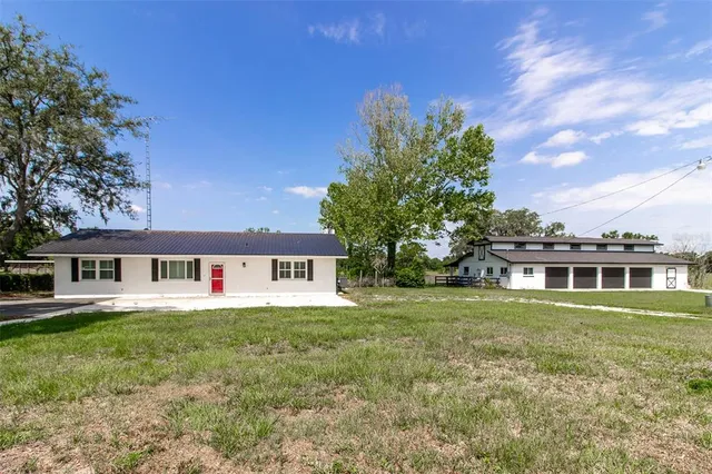 a view of a house with a garden