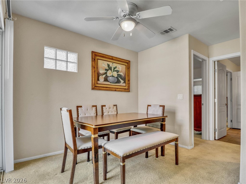 3145 East Flamingo Road, Unit 2129 Las Vegas, NV 89121 - Photo 11 of 43 A well-lit dining area offers a casual space for everyday meals.