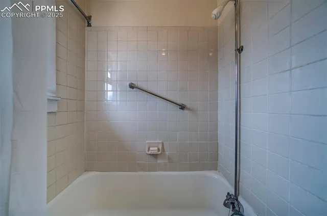 a bathroom with a bathtub