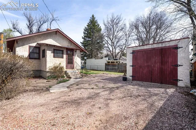 a front view of house with a yard