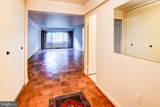 a view of hallway with natural light