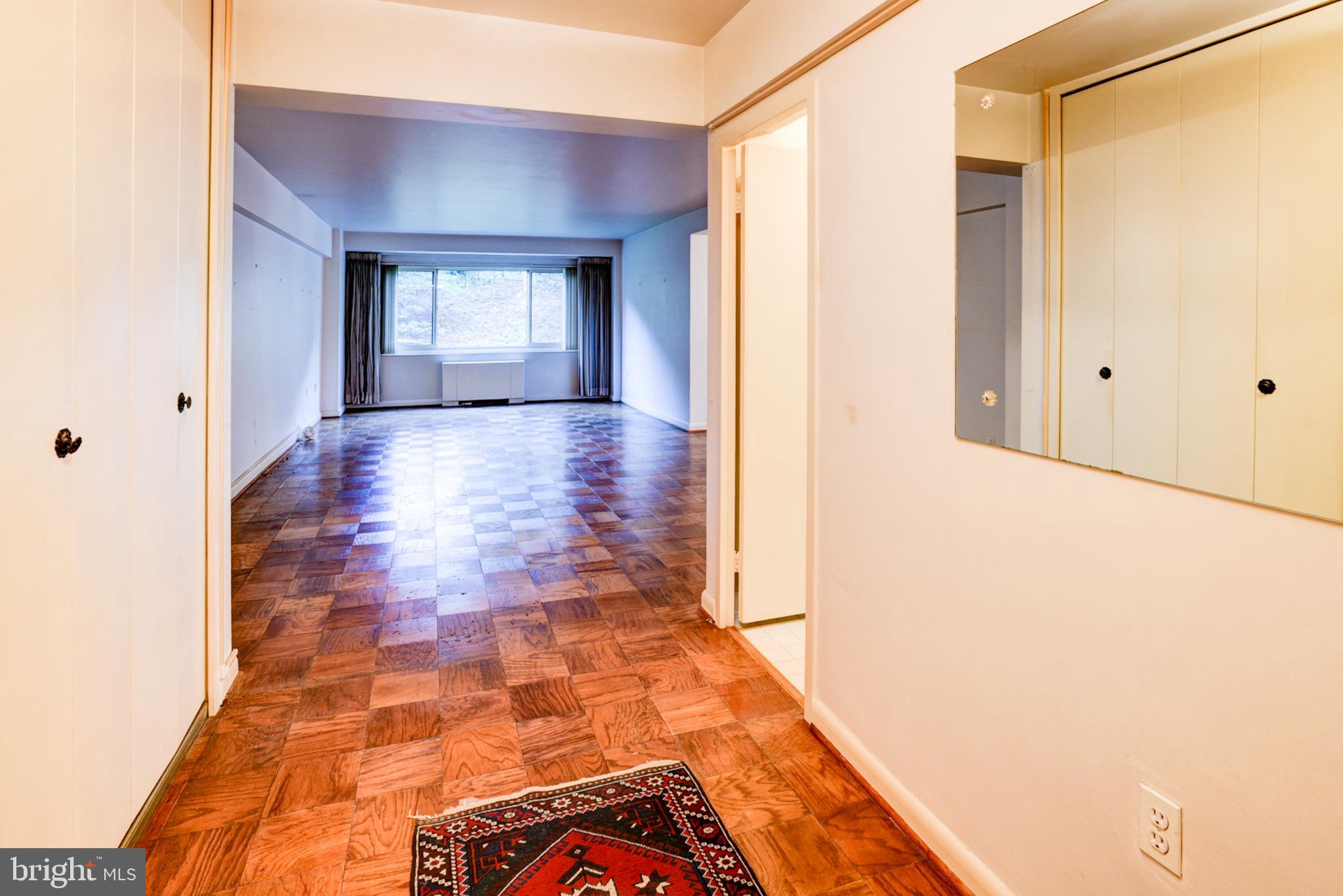 4201 Cathedral Avenue Northwest, Unit 201E Washington, DC 20016 - Photo 2 of 66 a view of hallway with natural light