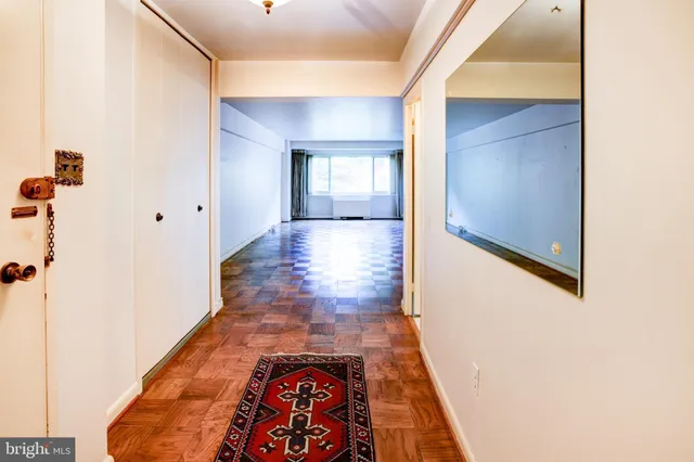 a view of a lobby with furniture and floor to ceiling window