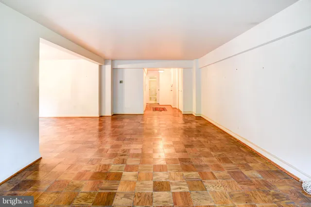 a view of an empty room and window