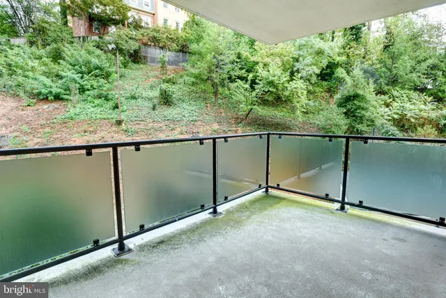 a very nice looking room with a large mirror and a chandelier