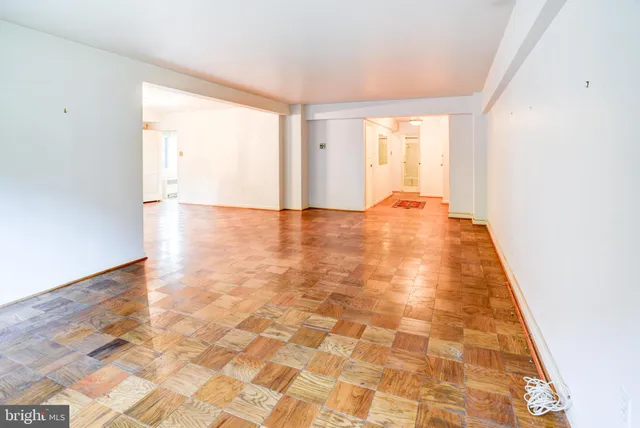 a view of an empty room with a window