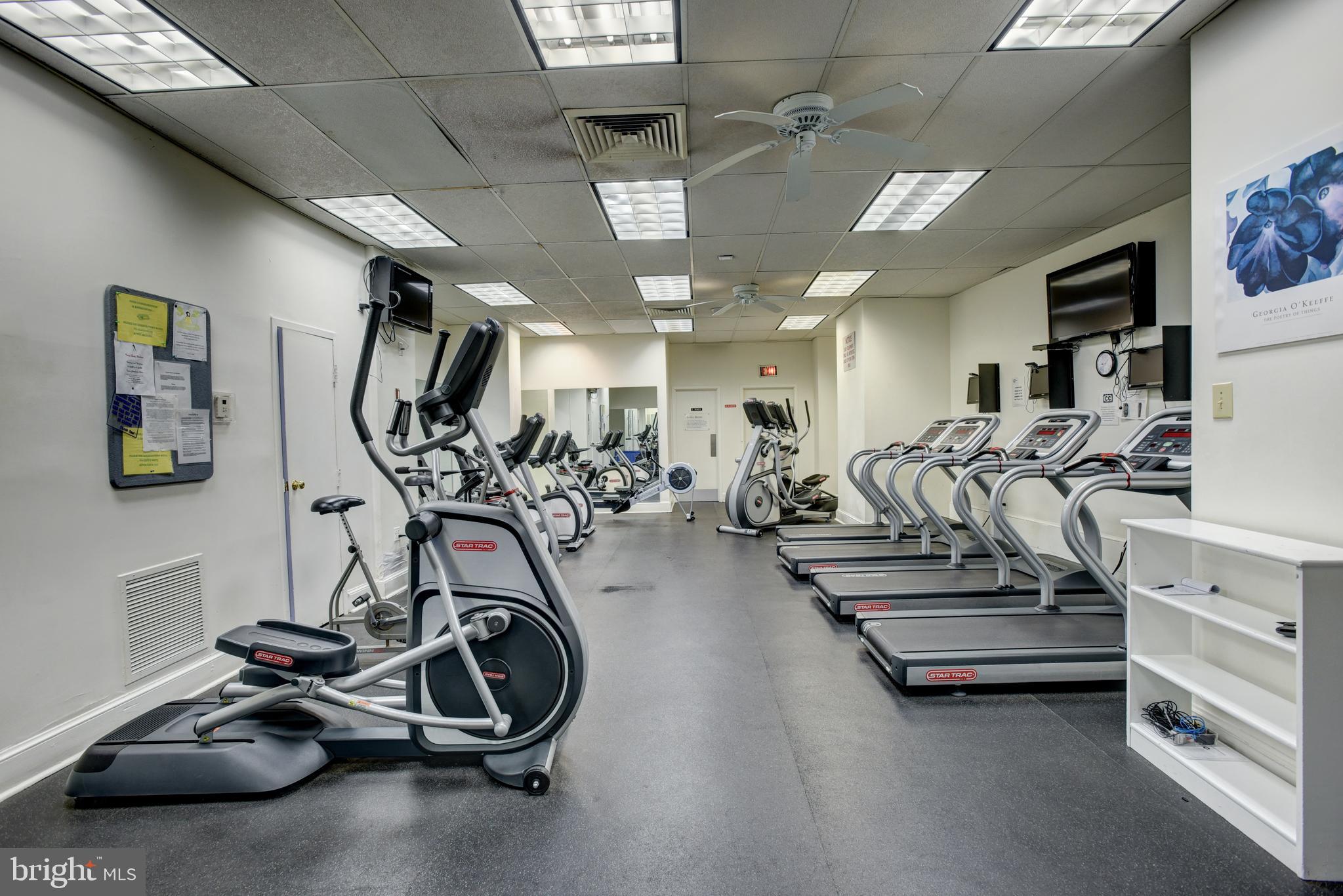 4201 Cathedral Avenue Northwest, Unit 201E Washington, DC 20016 - Photo 60 of 66 a view of a room with gym equipment