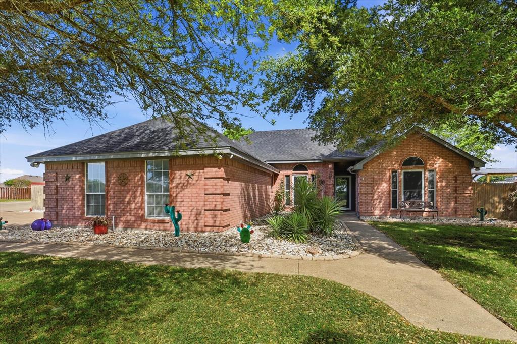 217 Seay Road Italy, TX 76651 - Photo 1 of 38 Ranch-style house with a front yard and brick siding