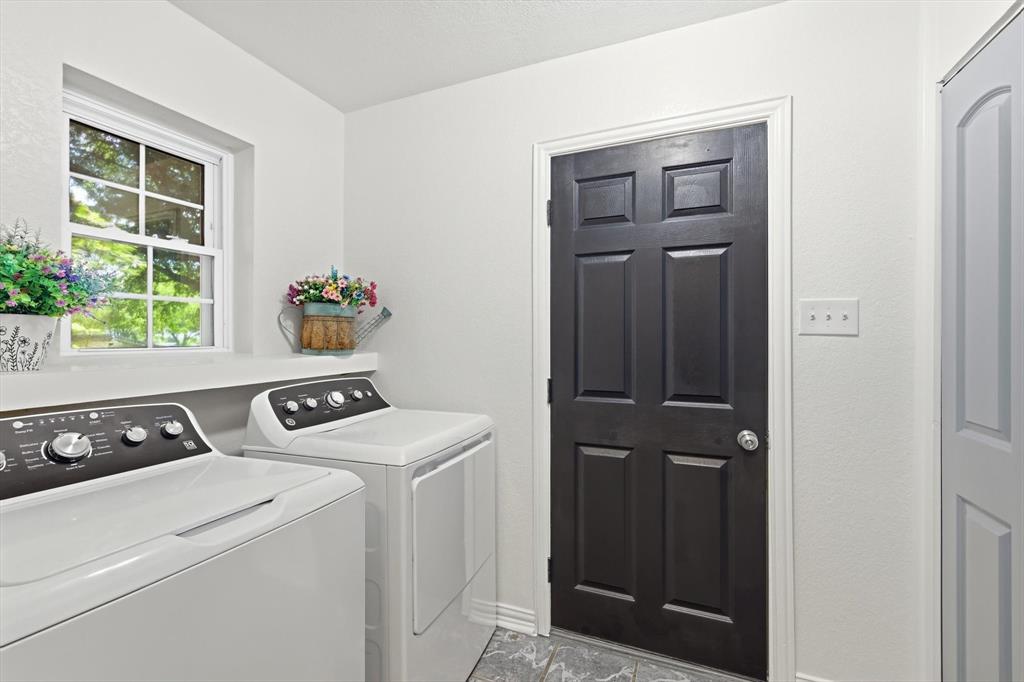 217 Seay Road Italy, TX 76651 - Photo 16 of 38 Laundry area featuring room for full washer and clothes dryer